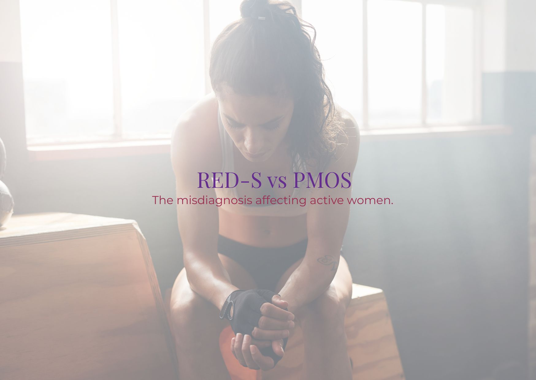Active woman resting in gym — illustrating RED-S and PMOS misdiagnosis in active women